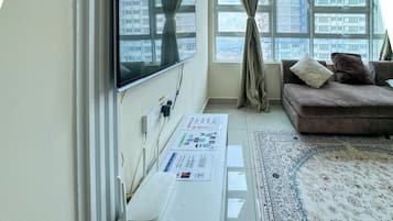 Apartemen Comfort, 3 kamar tidur, Bebas Asap Rokok, pemandangan kota | Area keluarga