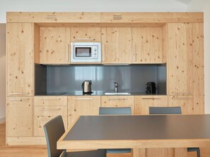 Fridge, microwave, cookware/dishes/utensils - Catrina 2-Zimmer Standard Apartment by Interhome (Disentis)