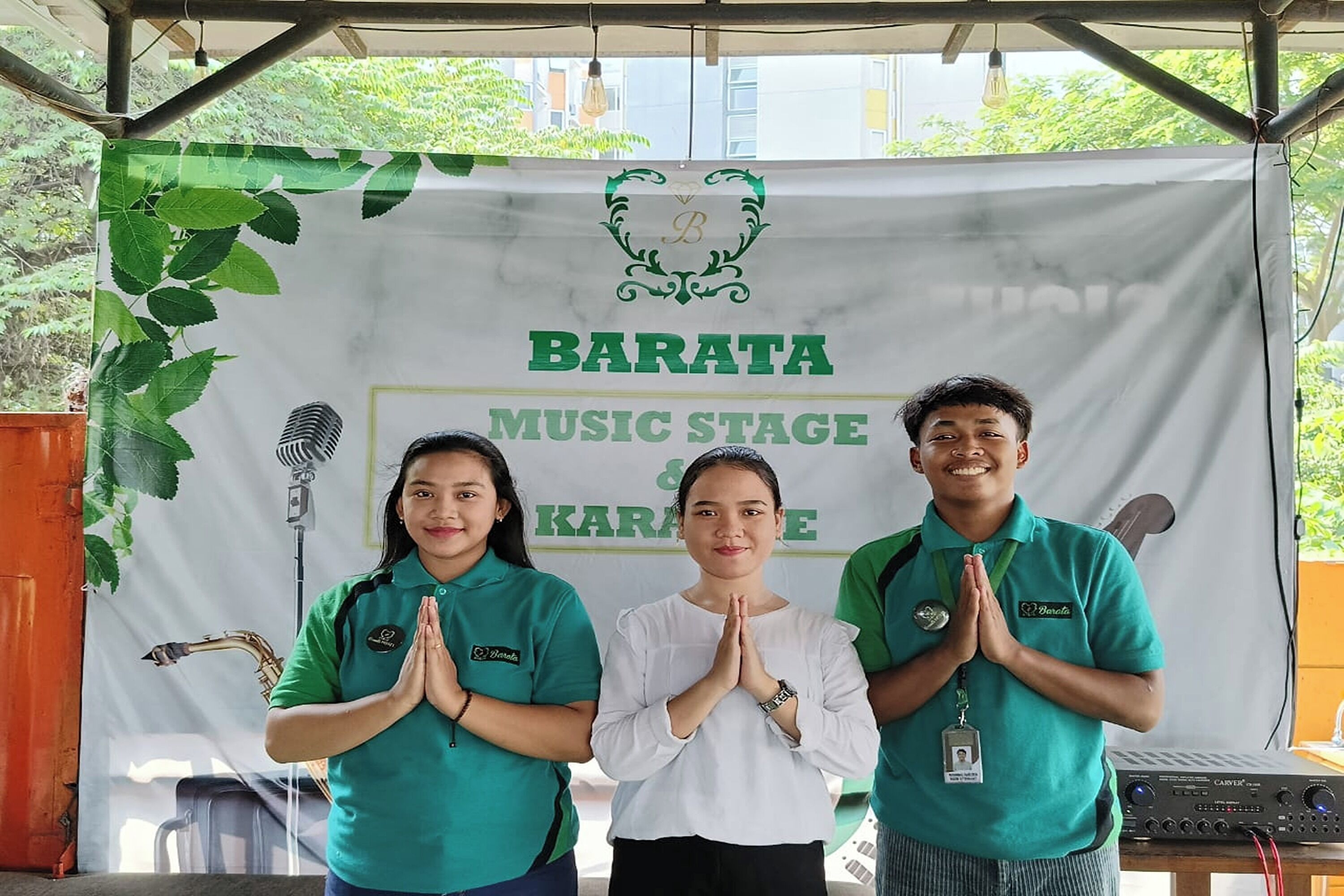 A stage with a banner reading "BARATA MUSIC STAGE & KARATE".