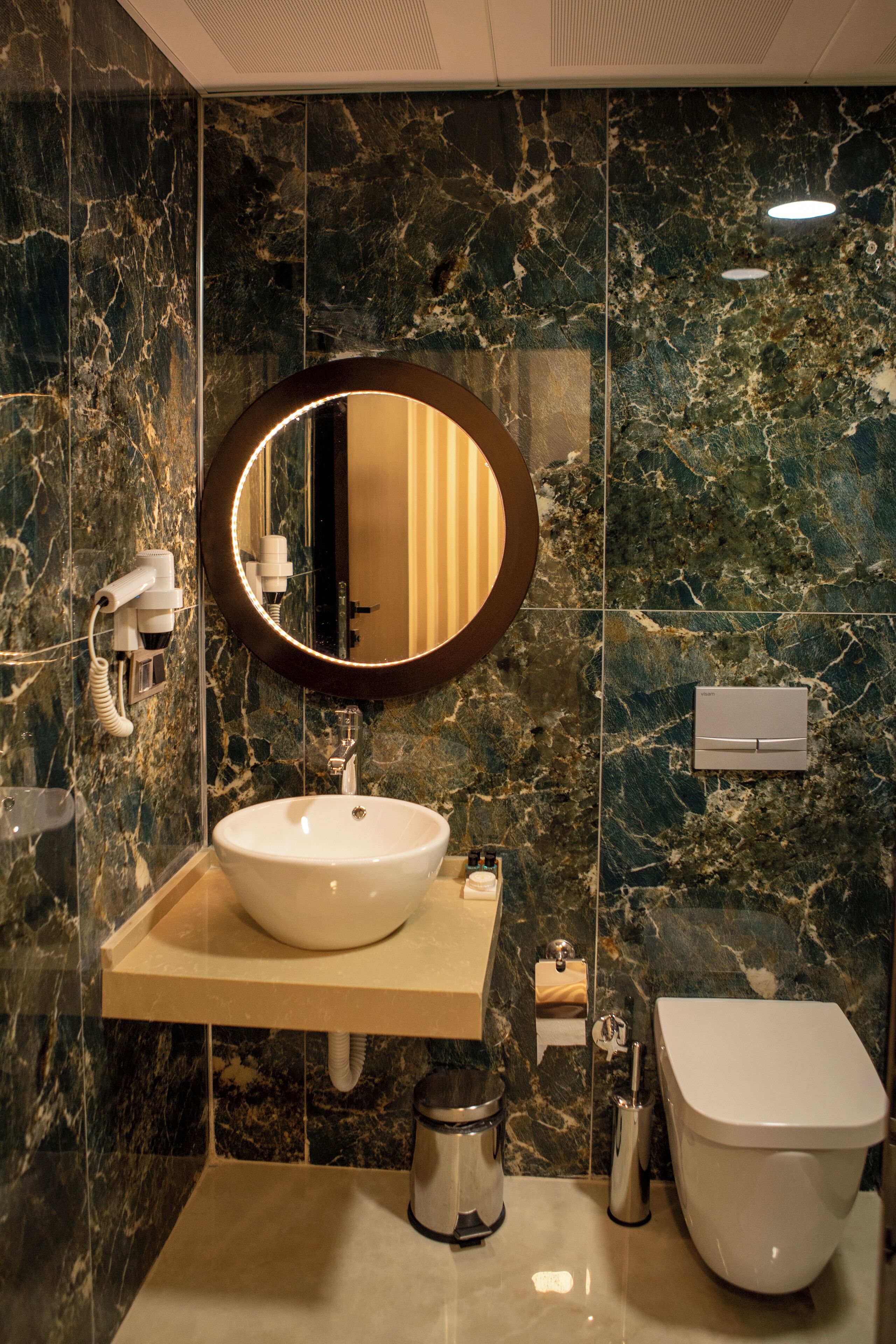 family room | bathroom | shower, hair dryer, slippers, towels