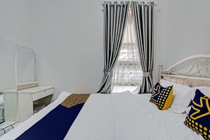 Double Room | Free WiFi, bed sheets - Hotel O Teguh Homestay Syariah (Pekanbaru)