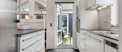 Fridge, microwave, dishwasher, cookware/dishes/utensils