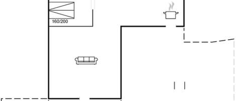 A floor plan with a kitchen, a dining area, and a living room.