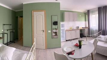 Family Room, 2 Double Beds | 1 bedroom, desk, free WiFi