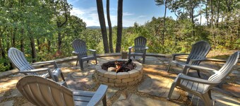 Amber Sunsets dazzles with panoramic views, hot tub luxury, a custom firepit, screened porch, pool table, and pet-friendly hospitality!