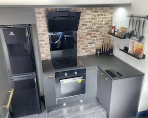 Fridge, microwave, oven, cookware/dishes/utensils