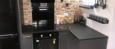 Fridge, microwave, oven, cookware/dishes/utensils
