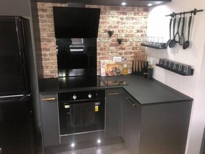 Fridge, microwave, oven, cookware/dishes/utensils