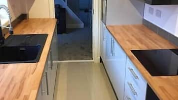 Fridge, microwave, cookware/dishes/utensils