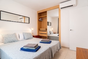 Apartamento superior | 1 quarto, cortinas blackout, Wi-Fi de cortesia, roupa de cama