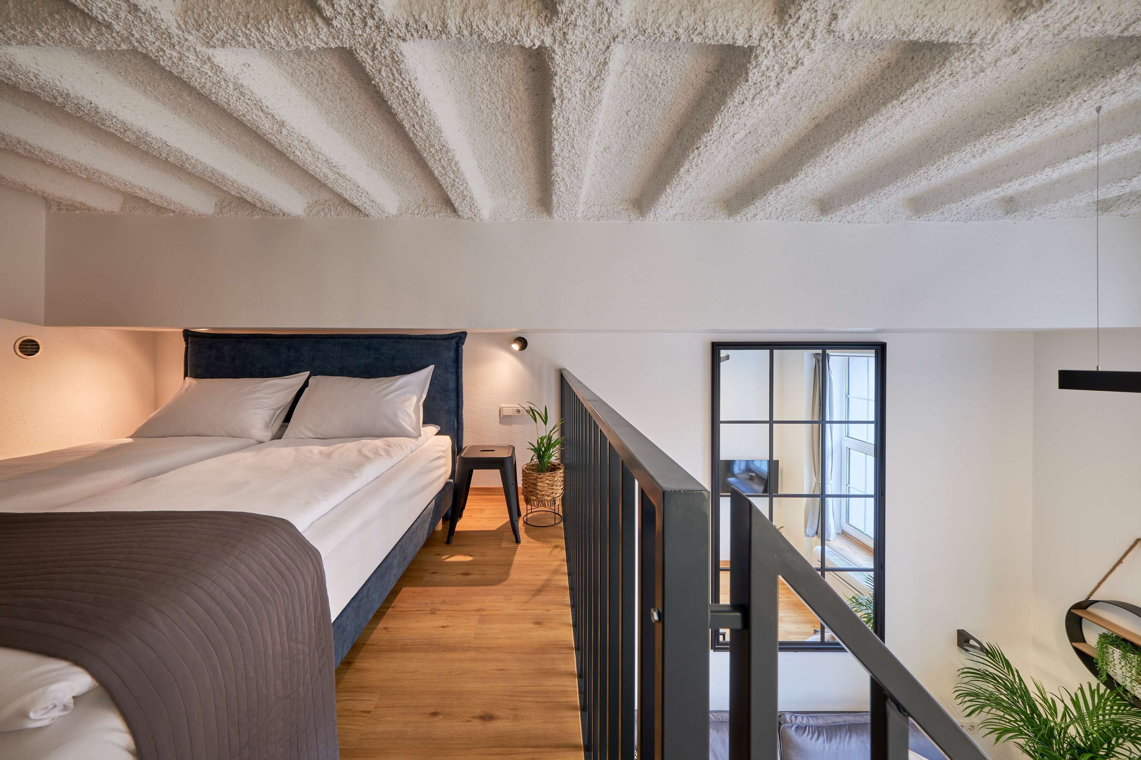 City Loft | 1 bedroom, premium bedding, laptop workspace, blackout curtains