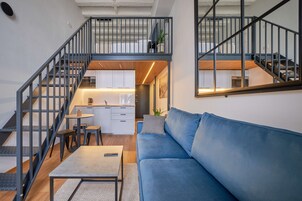 City Loft | 1 bedroom, premium bedding, laptop workspace, blackout drapes