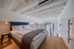 City Loft | 1 bedroom, premium bedding, laptop workspace, blackout curtains