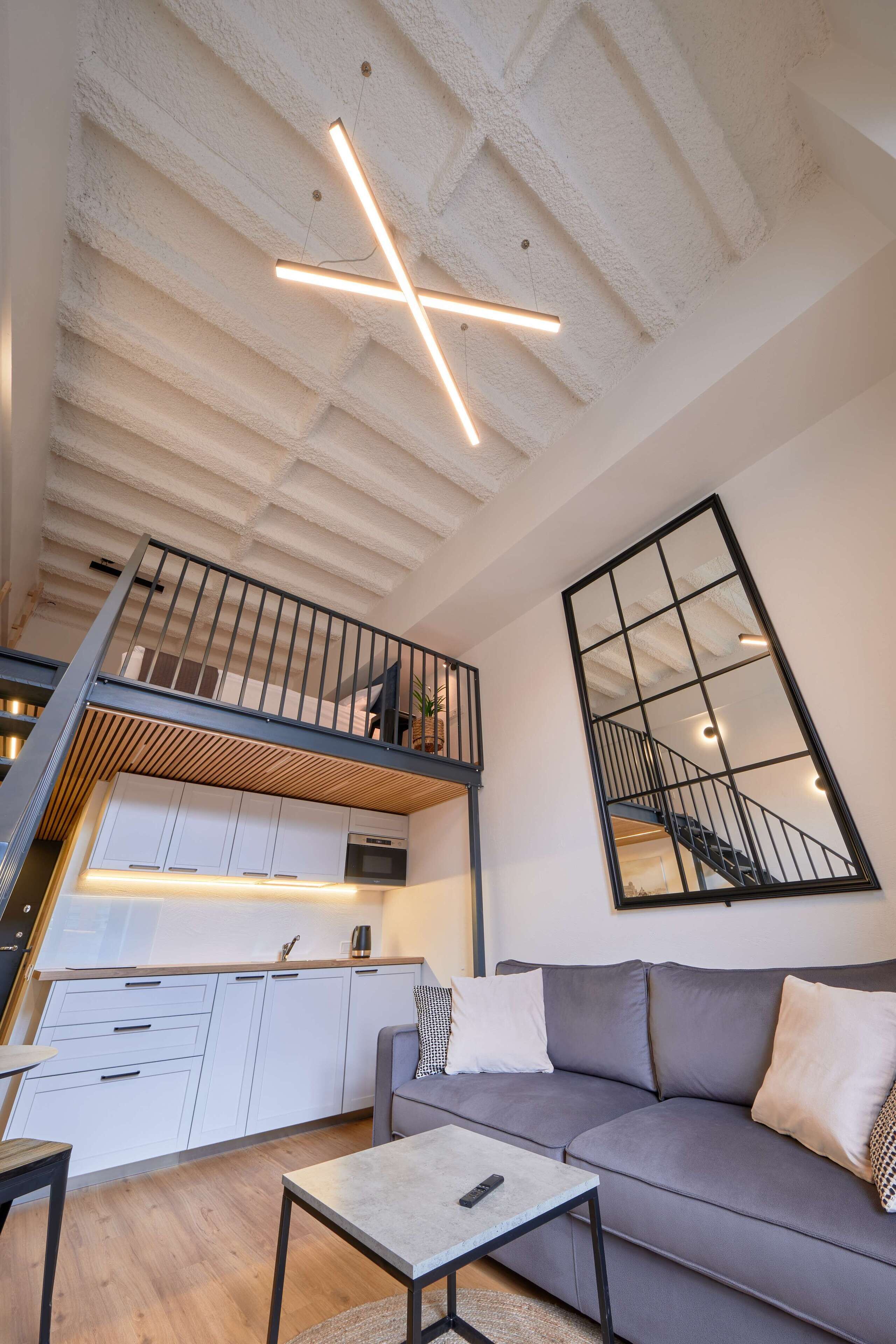 City Loft | 1 bedroom, premium bedding, laptop workspace, blackout curtains