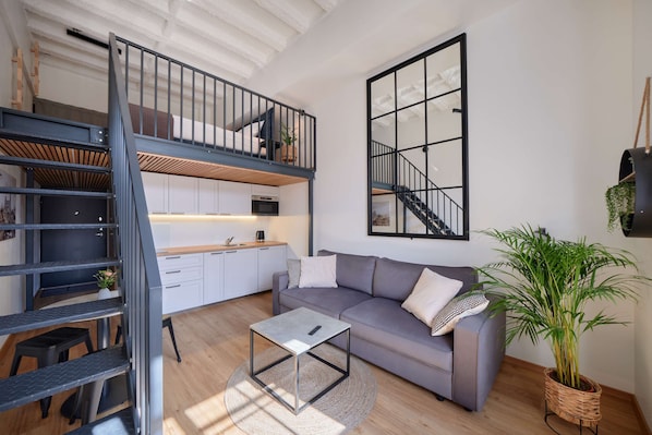 City Loft | 1 bedroom, premium bedding, laptop workspace, blackout curtains