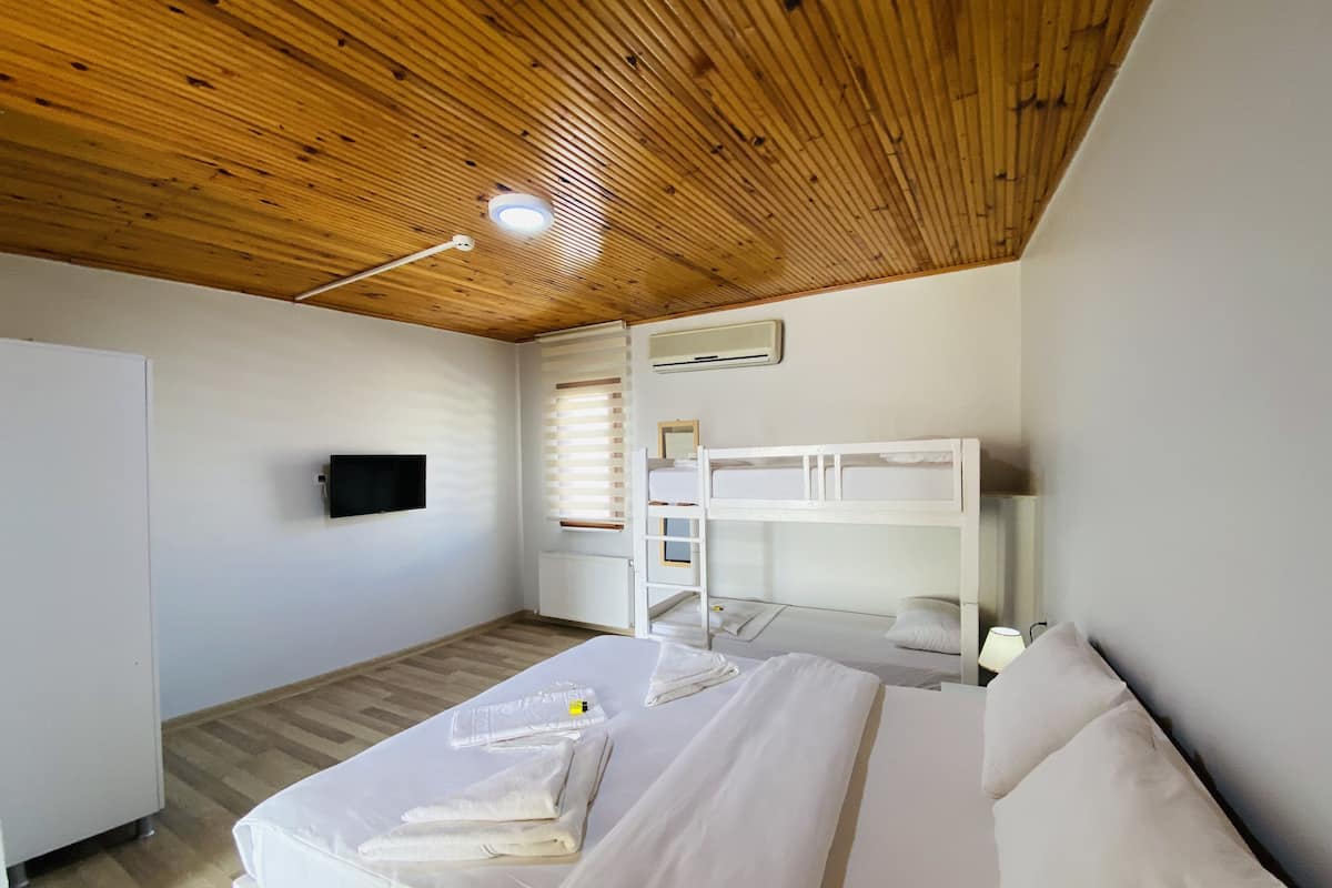 Family Quadruple Room | Premium bedding, in-room safe, soundproofing, iron/ironing board