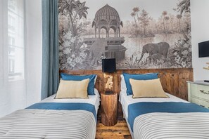 3 slaapkamers, een strijkplank/strijkijzer, gratis wifi, beddengoed