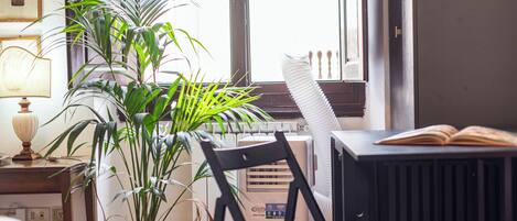 Comfort Apartment | Living area | 32-inch flat-screen TV with digital channels