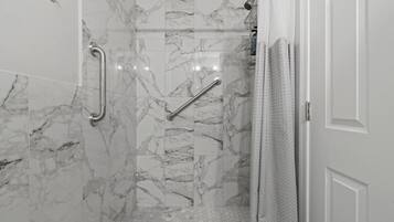 Bathtub, hair dryer, towels
