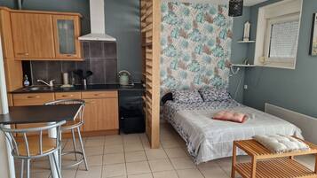 Fer et planche Ă repasser, draps fournis