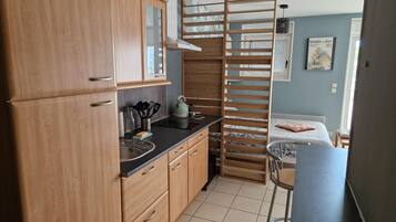 Fer et planche Ă repasser, draps fournis