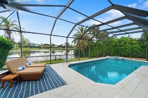 Outdoor pool, a heated pool - Luxe Lakeside Living: Stunning Home w/ Pool & Spa (Naples)