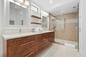 Shower, hair dryer, towels, soap