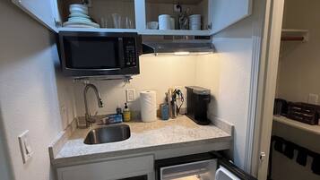 Fridge, microwave, coffee/tea maker, toaster