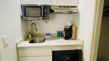 Fridge, microwave, coffee/tea maker, toaster