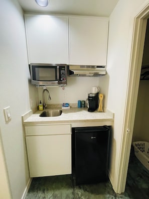 Fridge, microwave, coffee/tea maker, toaster