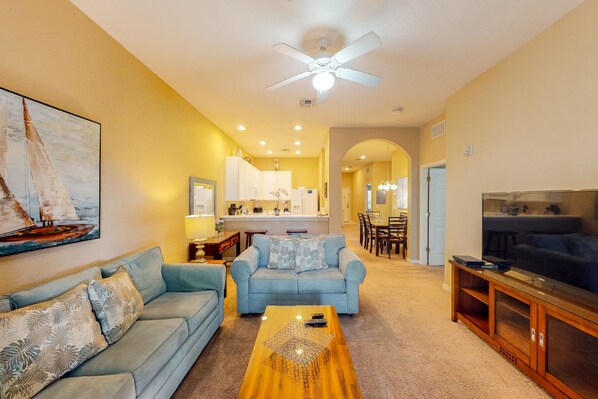 Téléviseur, lecteur de DVD, table de baby-foot, table de ping-pong