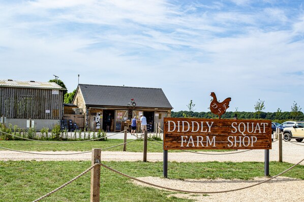 A farm shop sign with a rooster decoration. - Charming family friendly property in the Cotswolds - The Haven (Chipping Norton)