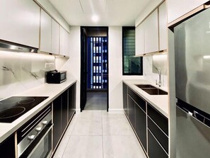 Family Apartment | Private kitchen | Full-sized fridge, microwave, oven, stovetop - The Rixx D1 Mension (Ho Chi Minh City)