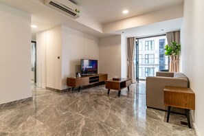 Family Apartment | Living area | Plasma TV - The Rixx D1 Mension (Ho Chi Minh City)