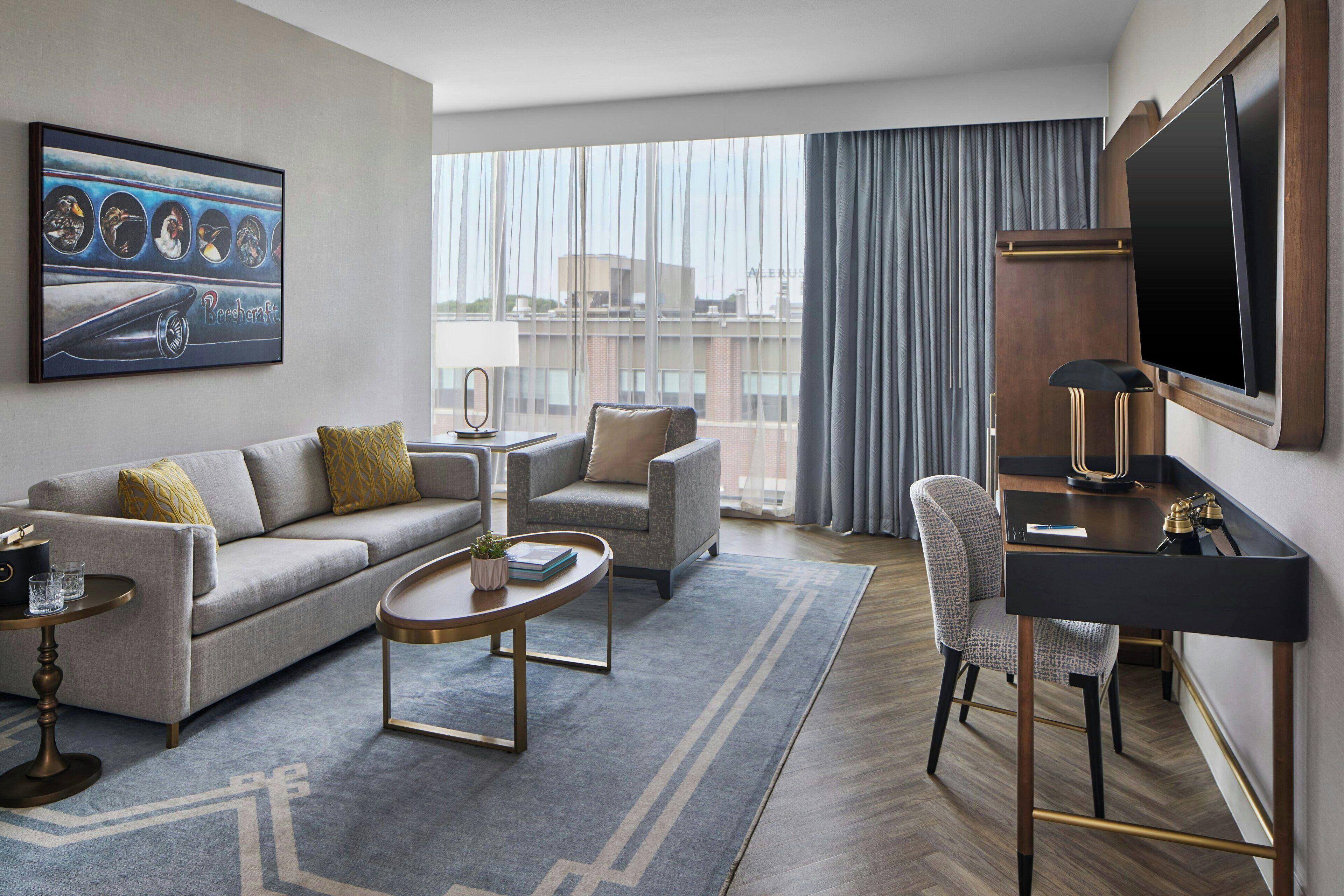 Suite, 1 King Bed, City View | Premium bedding, minibar, in-room safe, desk