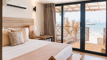 Deluxe Double Room Single Use, 1 Queen Bed, Air conditioning, Beach View | Premium bedding, minibar, WiFi (free), bed sheets