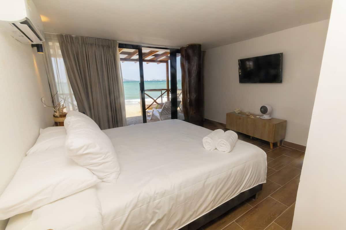 Deluxe Double Room Single Use, 1 Queen Bed, Air conditioning, Beach View | Free WiFi, bed sheets