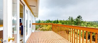 Peek-a-boo ocean view home with in-law suite, fireplace, & outdoor space