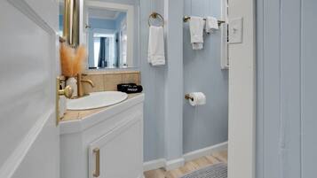 Shower, hair dryer, towels