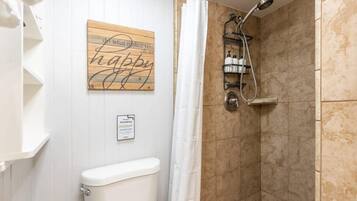Shower, hair dryer, towels, shampoo