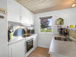 Fridge, microwave, dishwasher, cookware/dishes/utensils