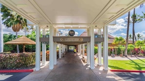 A covered walkway with a sign reading "Royal Hawaiian Hotel & Spa". - Dream of Aloha (Kapolei)