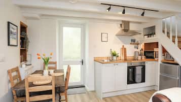 Fridge, electric kettle, toaster, cookware/dishes/utensils