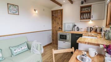 Fridge, electric kettle, toaster, cookware/dishes/utensils