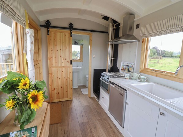 Fridge, electric kettle, cookware/dishes/utensils
