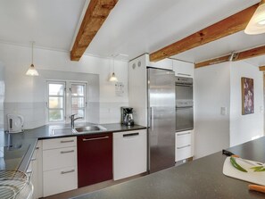 Fridge, microwave, dishwasher, cookware/dishes/utensils