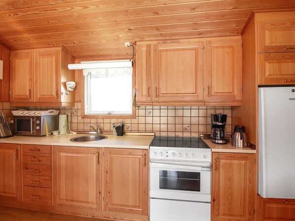Fridge, microwave, oven, high chair