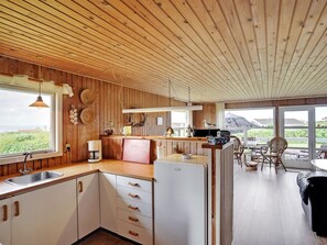 Fridge, oven, highchair, cookware/dishes/utensils