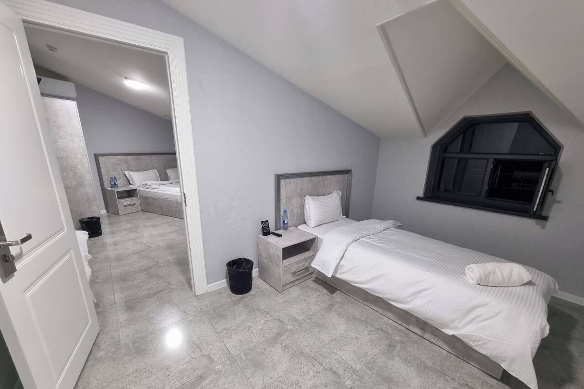Family Quadruple Room | Premium bedding, desk, soundproofing, iron/ironing board