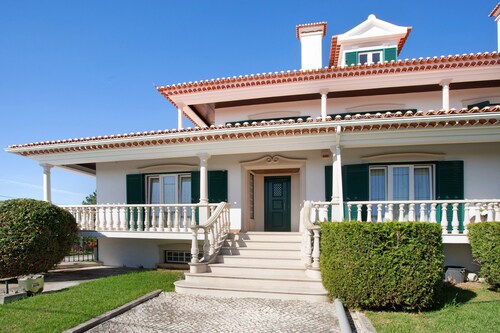 Holiday Home 'Casa Imaginário Com Serenidade' with Shared Garden, Wi-Fi and Air Conditioning